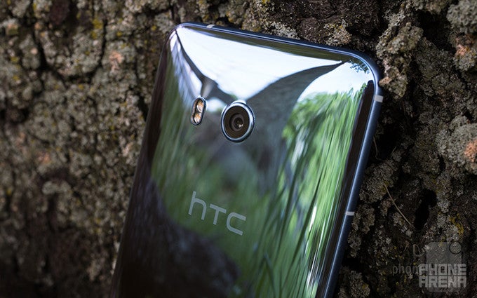 Squint hard enough and you'll see a bunch of smiling HTC executives in the phone's reflection - HTC's revenues are on the rise, and it's all thanks to the U11