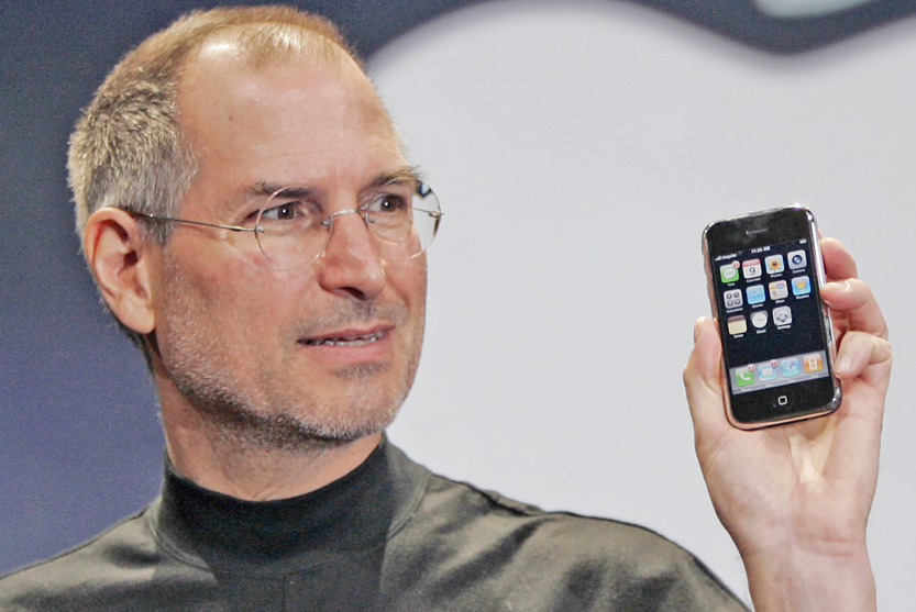 A moment frozen in time; Steve Jobs introduces the iPhone in 2007 - WSJ: Apple product delays double in length with Tim Cook as CEO
