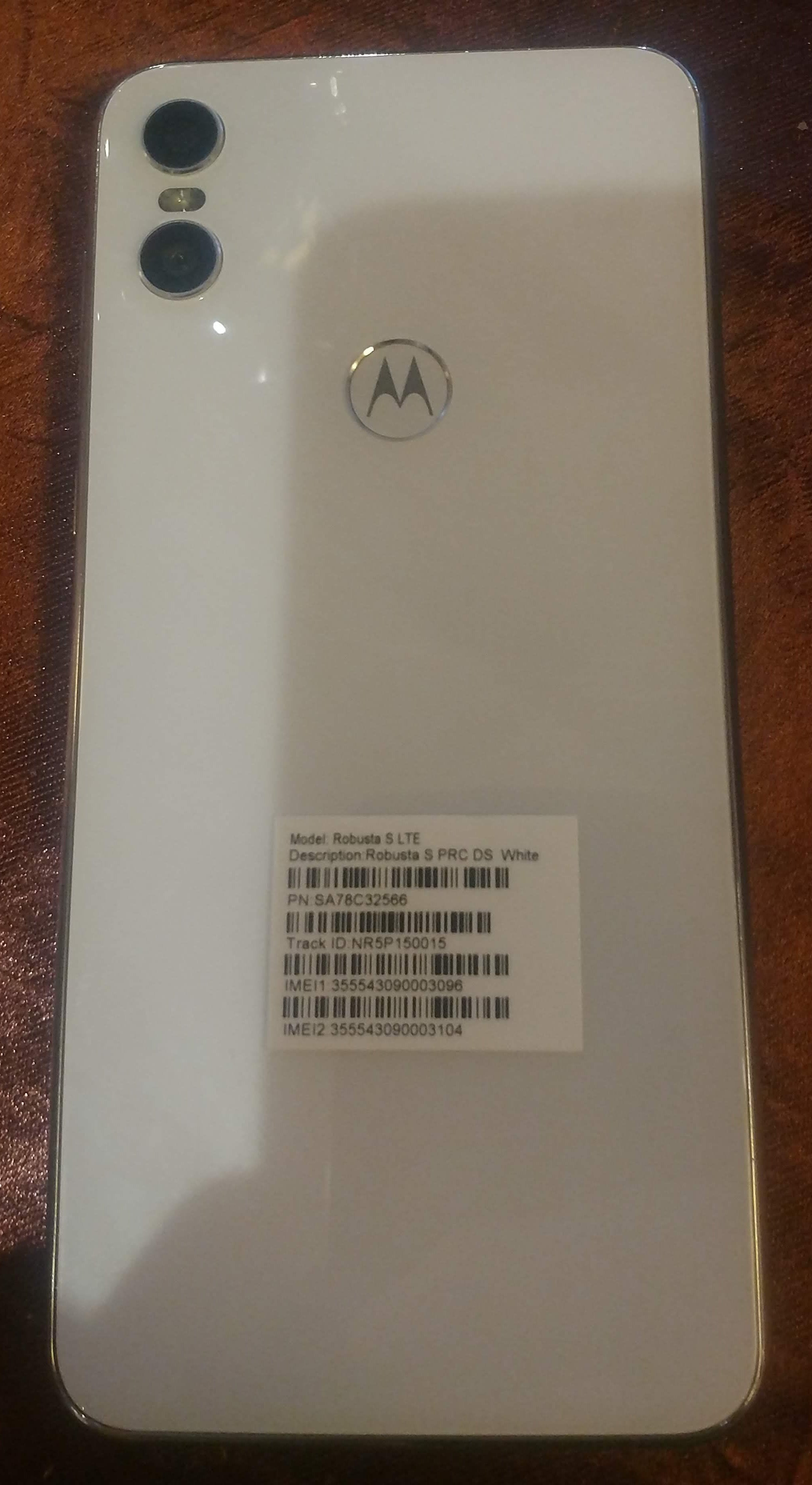 White Motorola One shows its glass rear finish in live images