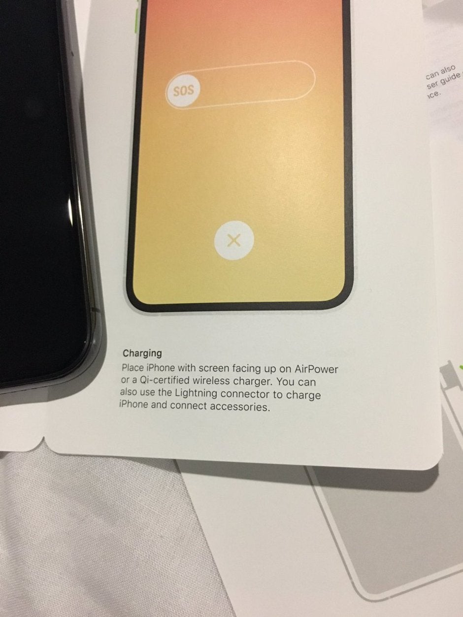 The photo tweeted by Gavin Stephens @ccgavind - iPhone XS manual reveals Apple wanted you to use AirPower for charging