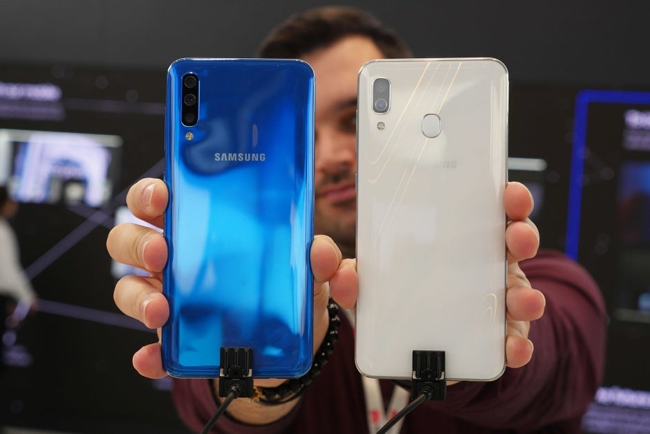 The A50 comes with three rear shooters, while the A30 settles for two and a rear-mounted fingerprint sensor - Two of Samsung&#039;s hot new mid-range phones are up for grabs with a US warranty