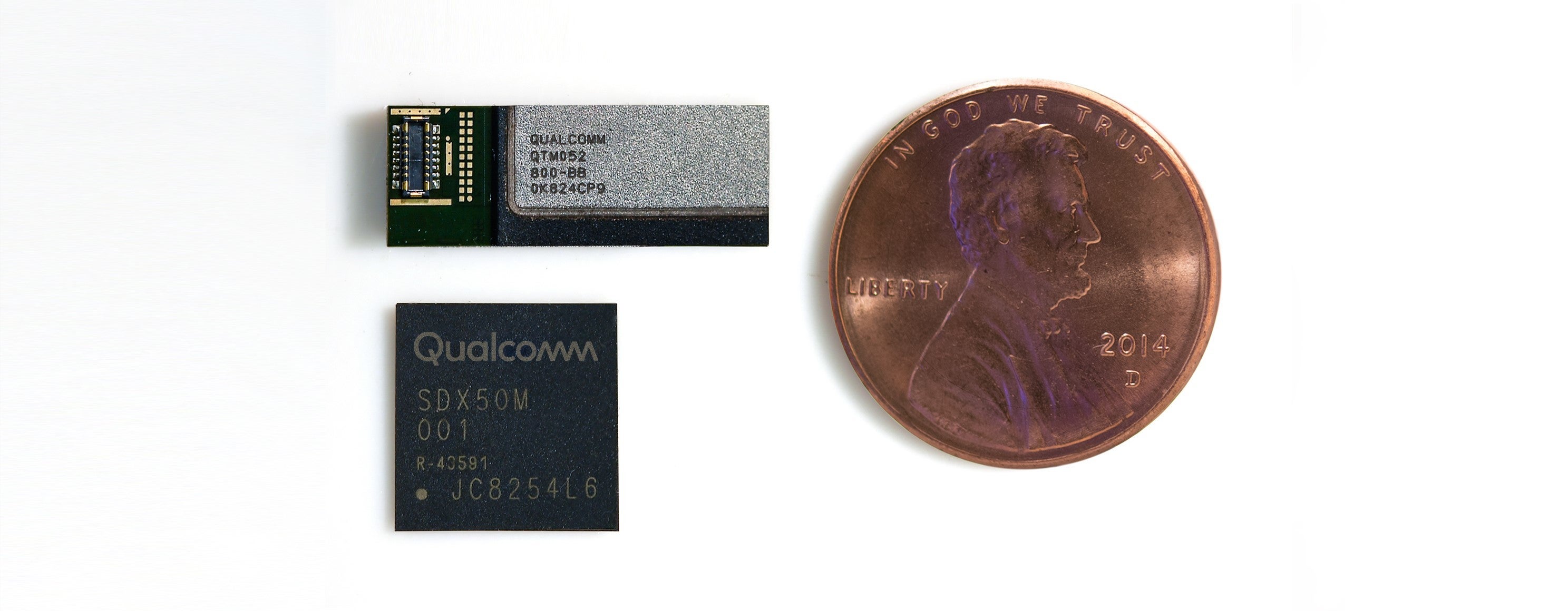 The Qualcomm Snapdragon X50 modem below and a single 5G antenna next to a penny - How long before 5G becomes a standard flagship smartphone feature?