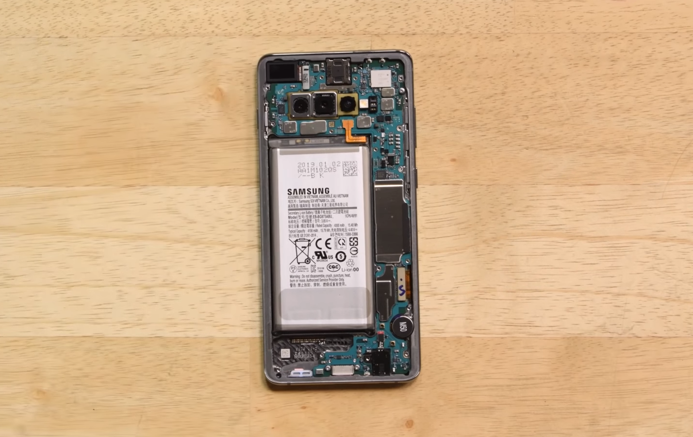 iFixit's teardown of the Galaxy S10+ shows the power button couldn't have been lower because of the battery - Why do phone makers let these design mistakes happen?