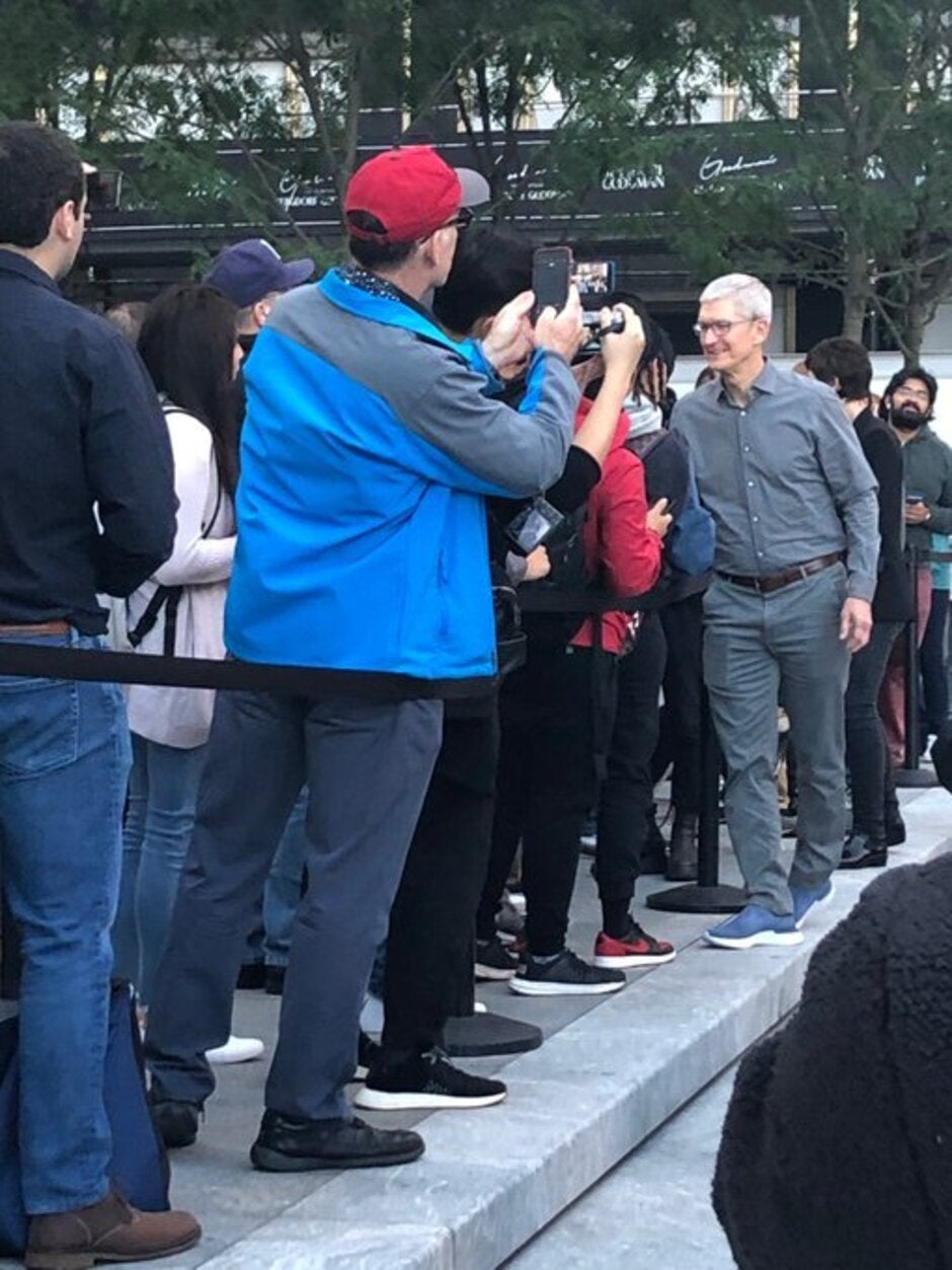 Tim Cook greets the crowd outside the re-opened Fifth Avenue Apple Store in New York - The 2019 Apple iPhones launch creating smaller lines outside Apple Stores worldwide