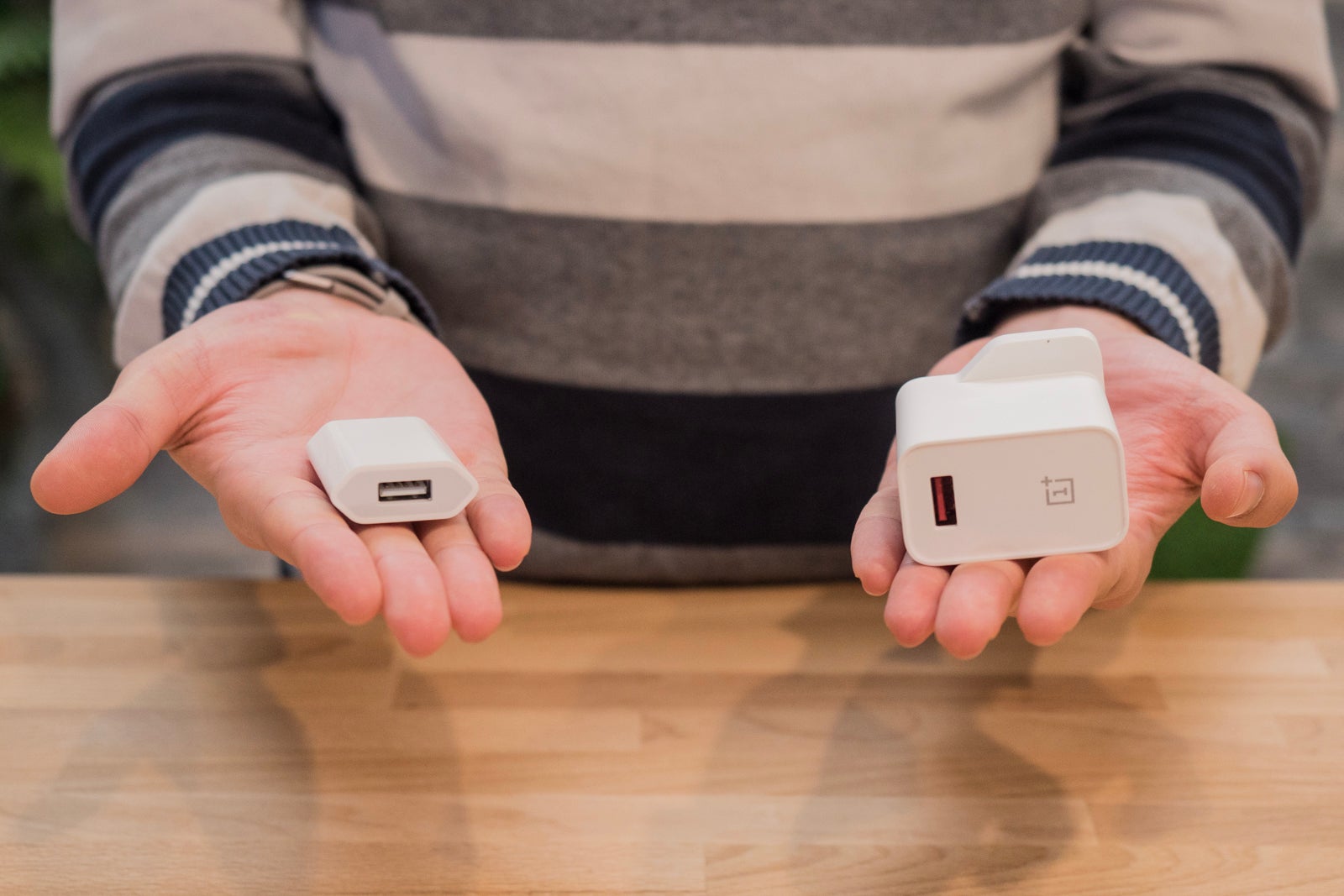 The iPhone 11&#039;s 5W charger on the left versus the OnePlus 7T 30W charger on the right, quite a difference, right? - The hidden challenges and limitations of fast charging in smartphones
