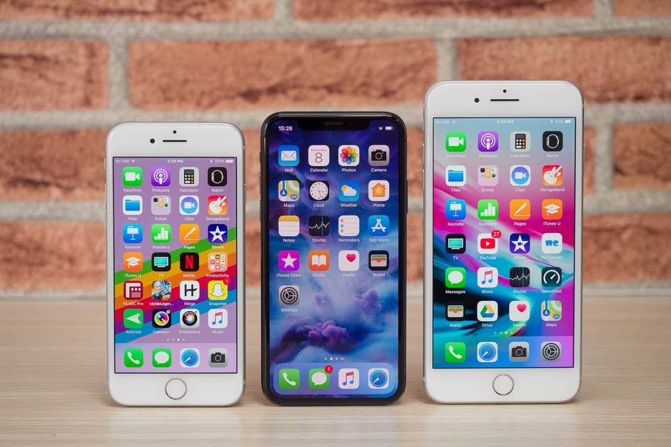 iPhone 8 (left), iPhone X (center) and iPhone 8 Plus (right) - Apple iPhone history: the evolution of the smartphone that started it all