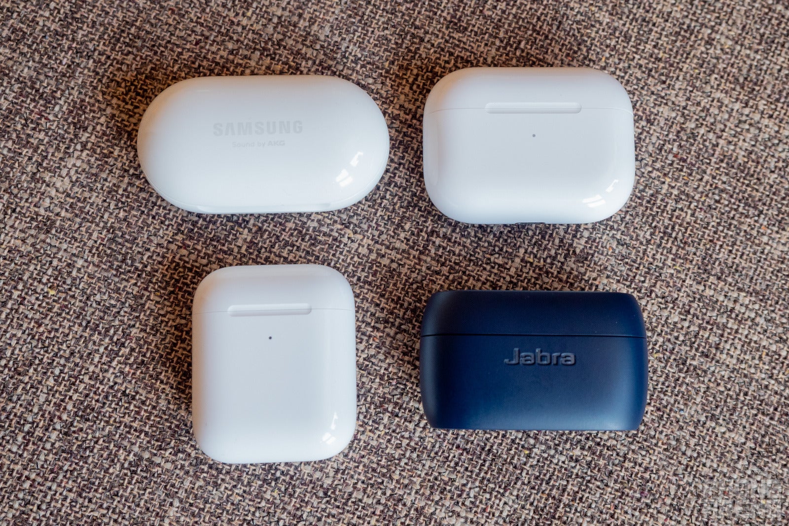 All four carrying cases are relatively small and fit nicely in a pocket - Samsung Galaxy Buds+ vs AirPods Pro, AirPods, Jabra Elite Active 75t