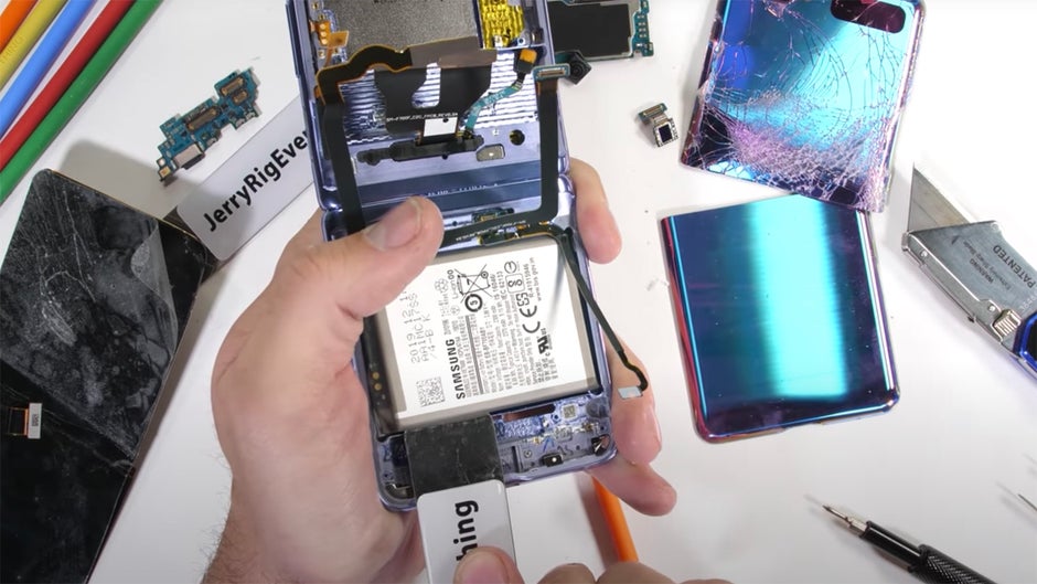 Biggest 2370mAh battery at the bottom of the phone - These images are from the Z Flip's awesome JerryRigEverything teardown - Samsung Galaxy Z Flip battery test complete: can foldable phones match?