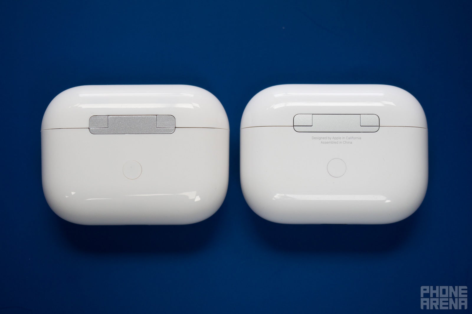 (Image credit - PhoneArena) Inspecting the backs of the two cases  - How to Spot Fake AirPods Pro: a complete guide