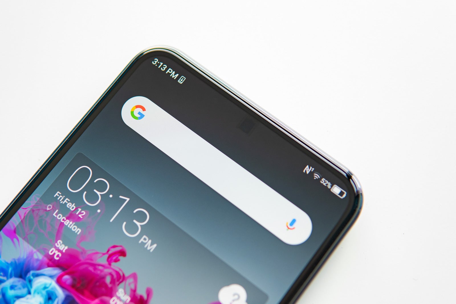 Although visible in photos like this one, the square above the camera is hard to notice with the naked eye on this wallpaper - A close look at the world&#039;s first under-display phone camera