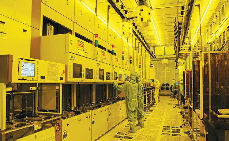 Inside a TSMC fab where the lights are yellow to protect the safety of the wafers being produced - TSMC reportedly asked by the U.S. to build a total of six fabs in the states