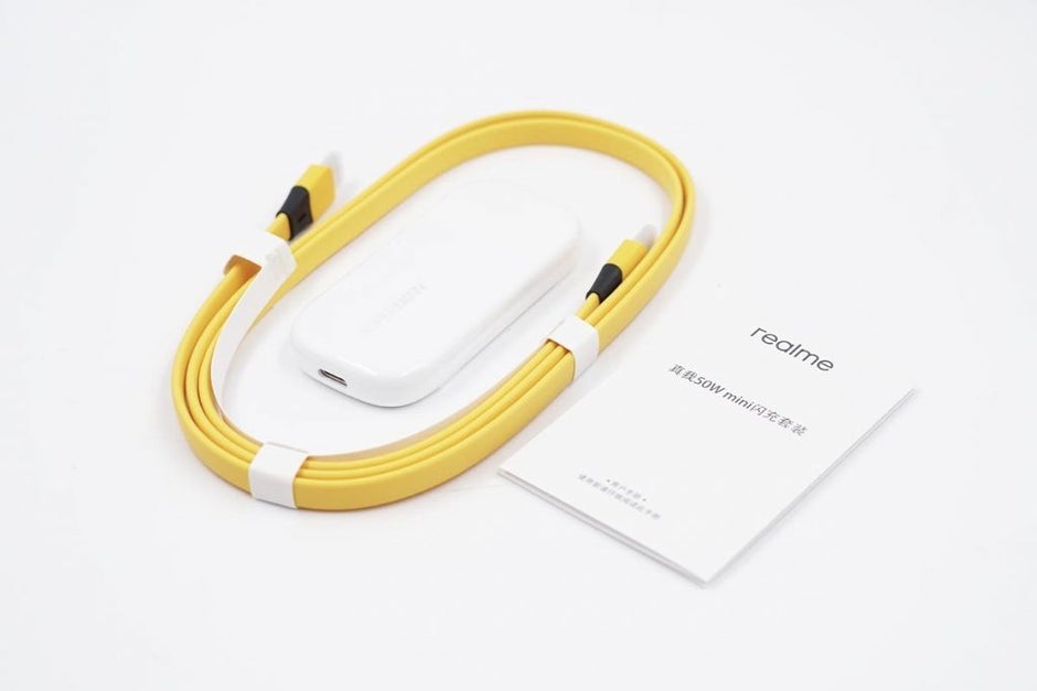 The classic &quot;Realme Yellow cable, which plays a part in the whole &quot;magic&quot;.&quot; - Is this the future of fast wired charging: 55 grams = 50W of power