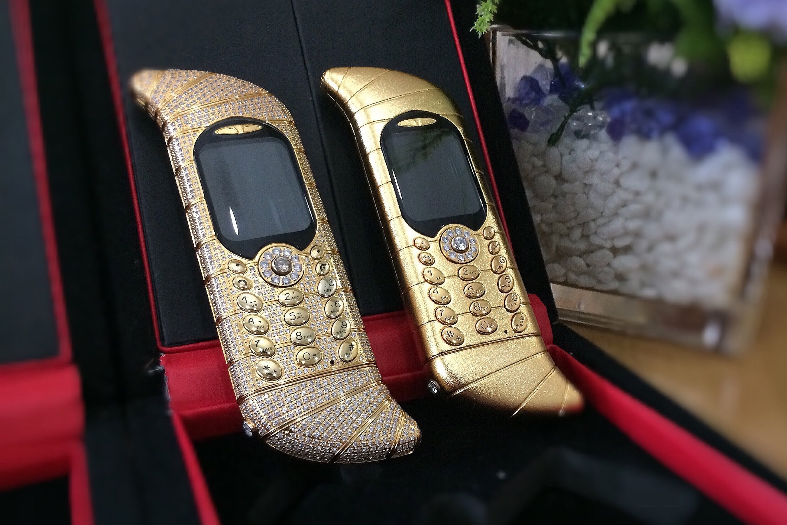 Two of the three Le Million phones on display - The million-dollar tilde-shaped dumb phone – Odd Phone Mondays