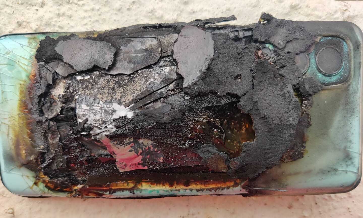 A OnePlus Nord 2 5G after its battery exploded - OnePlus Nord 2 5G gets cooked well done after its battery explodes