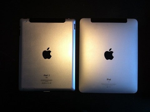 The Apple iPad 2 (L) appears to be smaller than the original model with a flatter back and more angular sides - New pictures of Apple iPad 2 leak