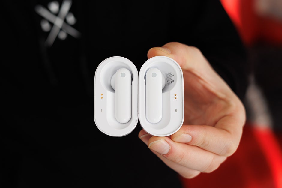 The charging case is held by magnets, splits in two - Timekettle's translator earbuds break language barriers, bring in simultaneous translation