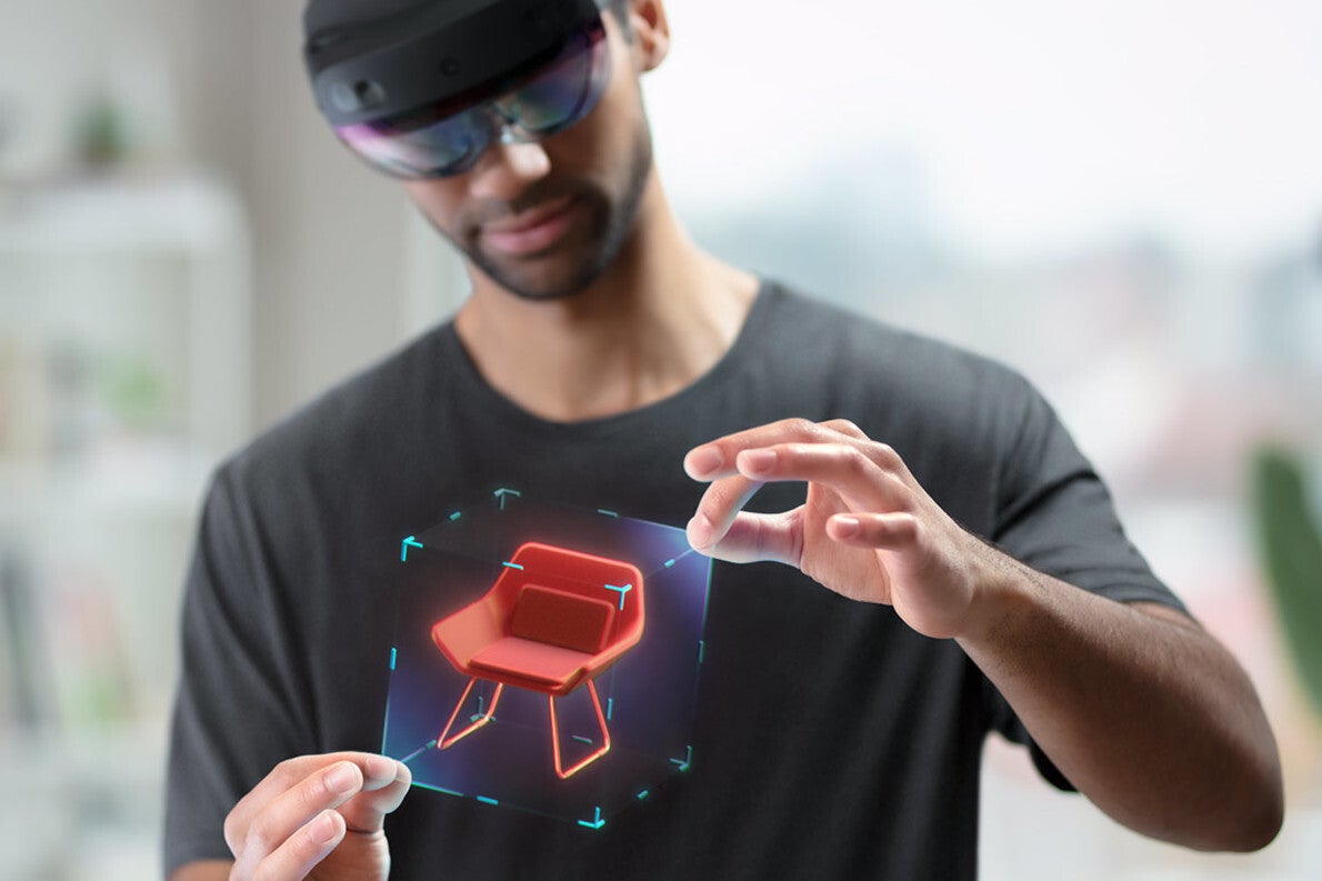 Microsoft HoloLens 2 showcases interacting with virtual objects placed on top of the real world, image source - Microsoft - Apple&#039;s mixed reality headset could feature smooth switching between AR and VR