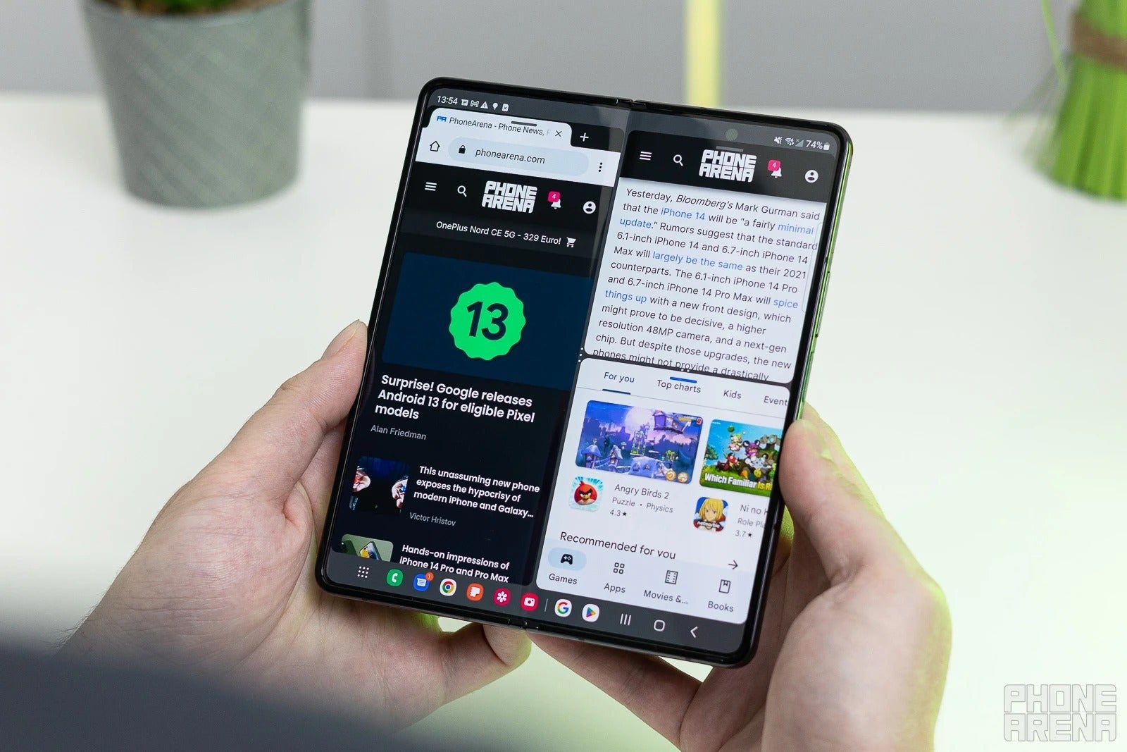 (Image credit - PhoneArena) Android 12L taskbar displayed on the Samsung Galaxy Z Fold 4 - Samsung starts rolling out big updates for older foldables and the Galaxy Watch 4