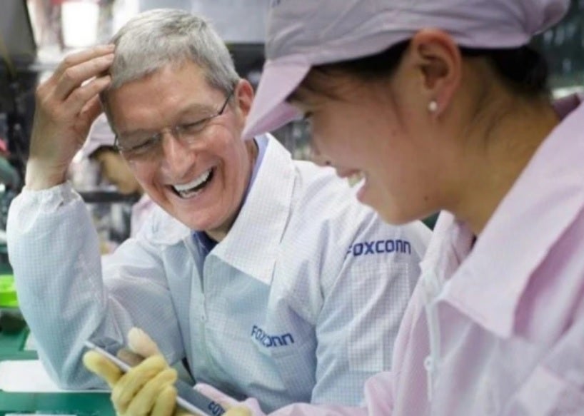 Apple CEO Tim Cook visits a Foxconn assembly line - Foxconn says iPhone production in China remains steady despite COVID restrictions