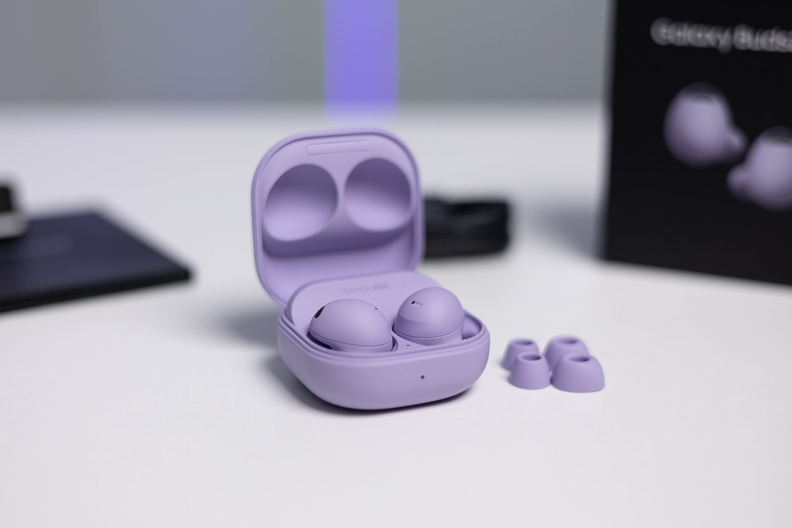 The Samsung Galaxy Buds 2 Pro come in a discreet Graphite or White, or in our case - the Bora Purple featured above.  - Get a free wireless charger with your discounted pair of Galaxy Buds 2 Pro while you can