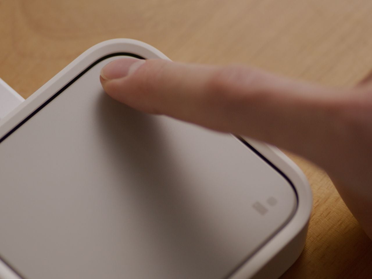 The Smart Button of the Samsung Station in action. - The Samsung SmartThings Station is super convenient and even doubles as a wireless charger