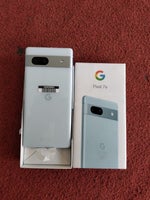 Google Pixel 7a unboxing images surface featuring Carbon and