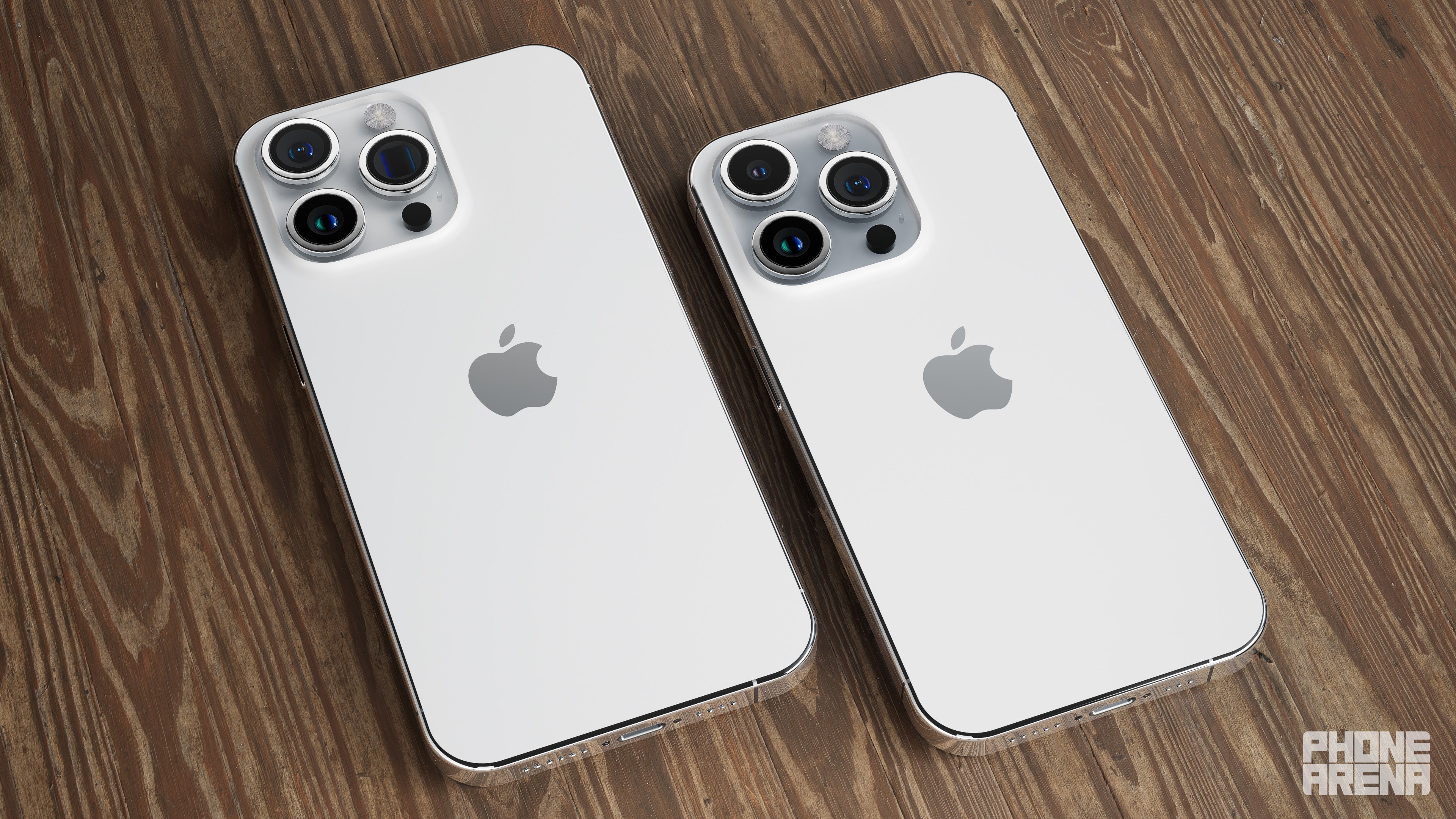 iPhone 15 Pro Max to the left, and iPhone 15 Pro to the right. Notice the difference between the lens near the right edge of the camera bump. - Here are all the expected iPhone 15 design changes visualized