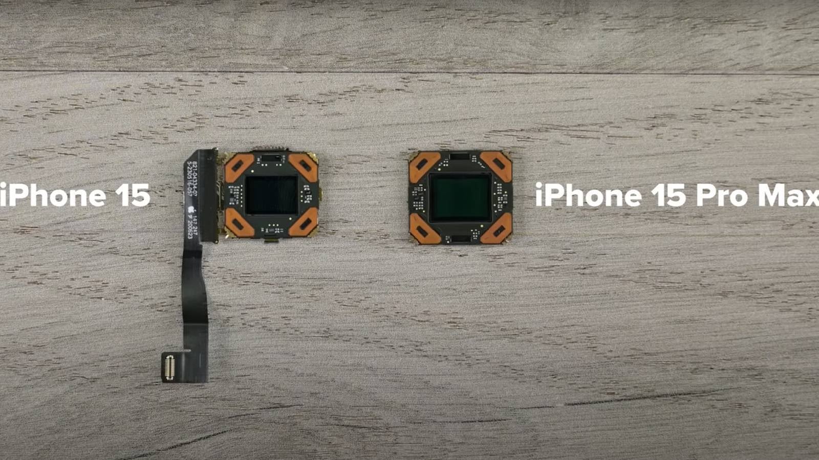 iPhone 15 vs iPhone 15 Pro Max main cameras - Microscopic image shows significant size difference between iPhone 15 and Pro Max's 48MP cameras