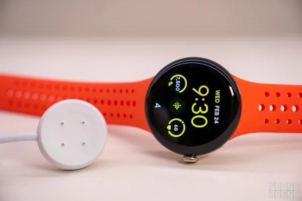 The Pixel Watch 2 and its new charging puck. Image credit - PhoneArena - You're not imagining it: The original Pixel Watch is indeed taking longer to charge after this change