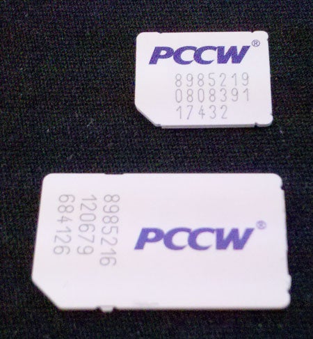 A micro SIM card (top) and a mini SIM card (bottom) compared - SIM cards getting smaller; Apple proposes shrinking them even further