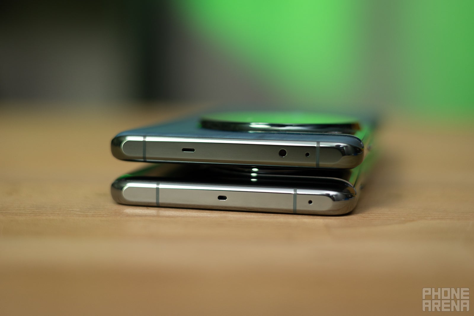 The OnePlus 12 (on top) has an IR blaster. And that probably makes much more sense than having a thermometer on your phone, right? - OnePlus 12 Hands-on: return to "Flagship Killer" form