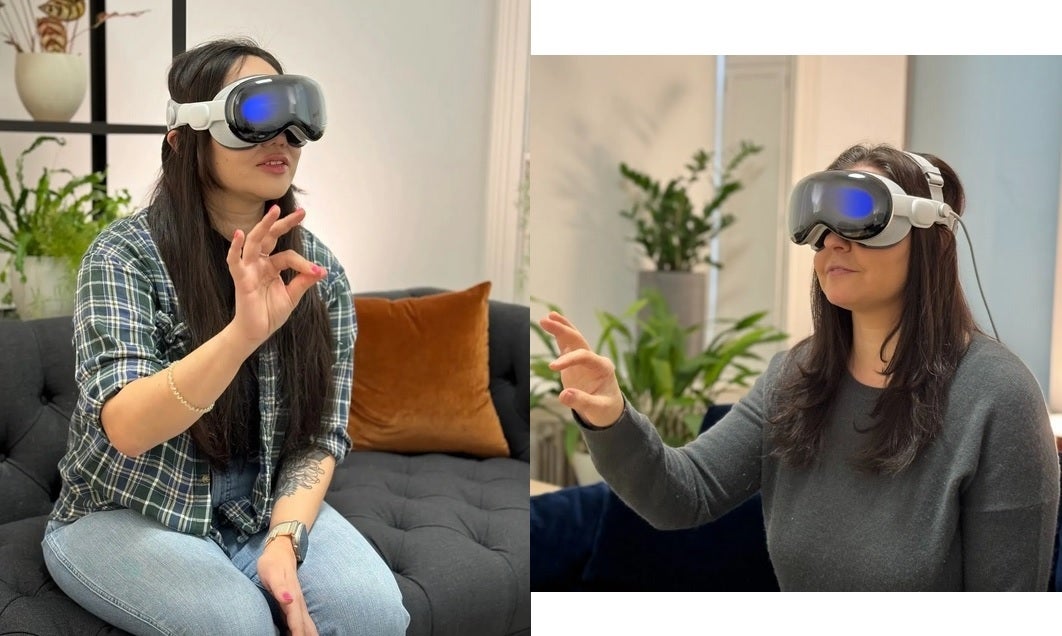 From L to R, The Verge's Victoria Song and the WSJ's Joanna Stern try the Vision Pro - Apple cropped Vision Pro photos to remove key part