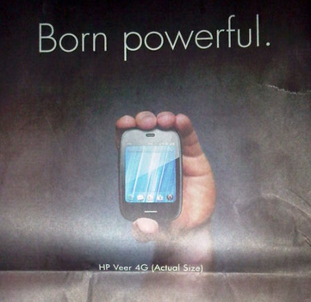 HP shows off the petite size of the Veer 4G on the back of the New York Times