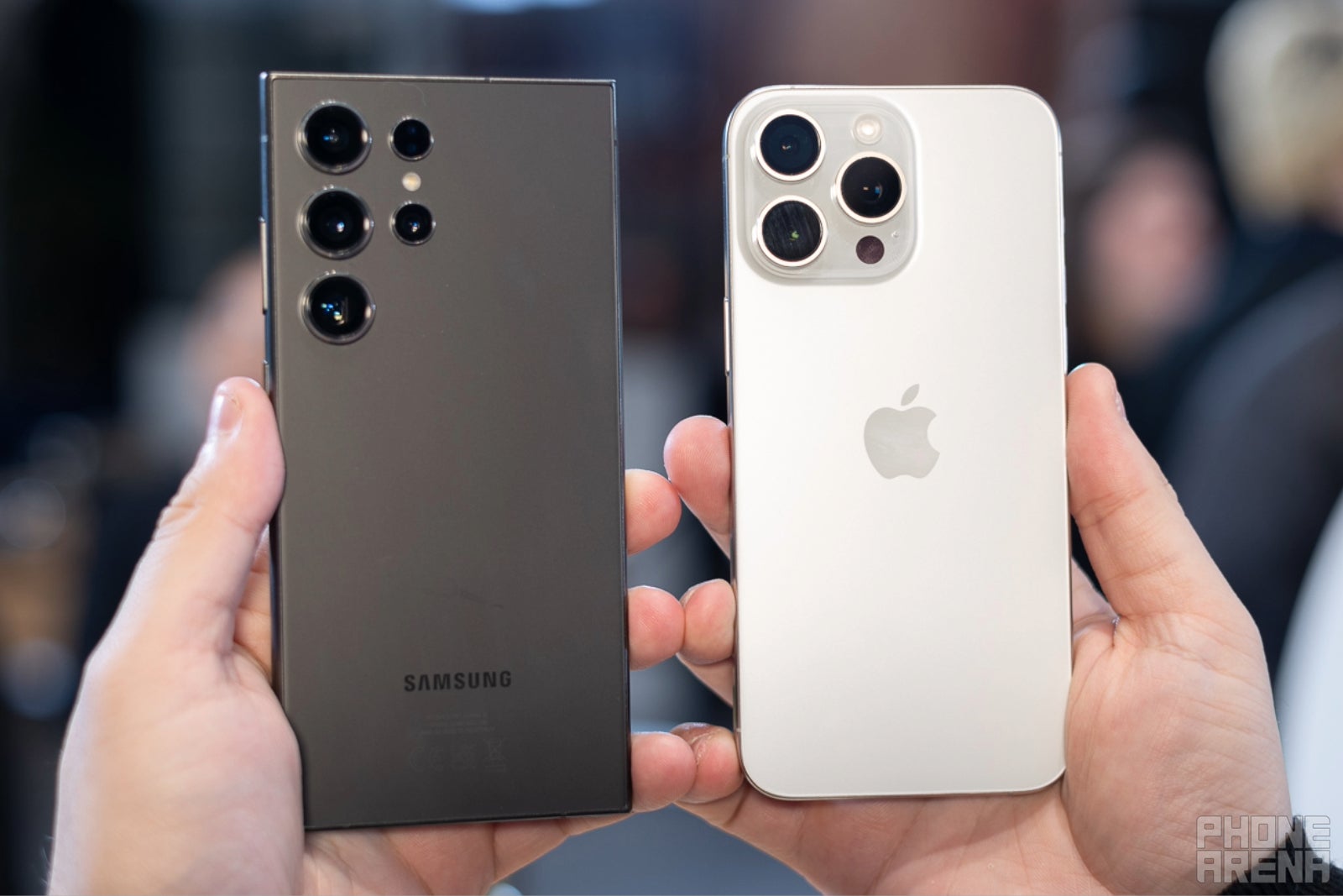 Galaxy S24 Ultra next to the iPhone 15 Pro Max (Image Credit–PhoneArena) - iPhone vs Galaxy duel gets sparked by Rihanna&#039;s concert, but are phone cameras that different anyway?