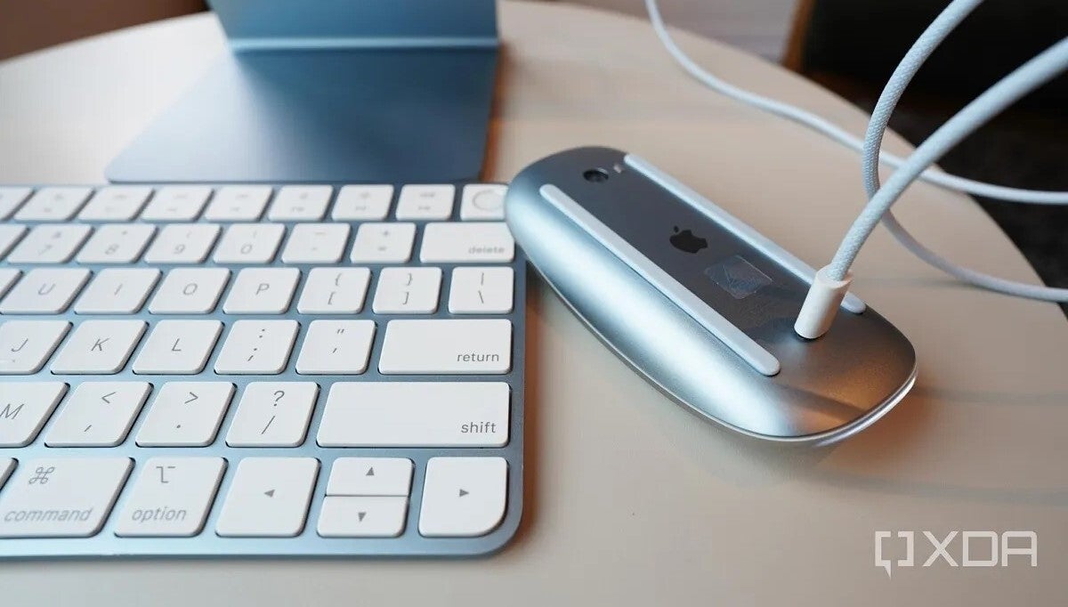An Apple Magic Mouse charging like it's supposed to (Source - XDA Developers) - A light-hearted look at my &quot;favorite&quot; Apple design fails (Vision Pro is in here too)