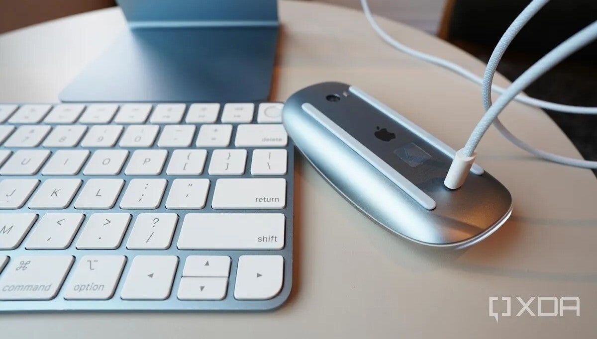 An Apple Magic Mouse charging like it's supposed to (Source - XDA Developers) - A light-hearted look at my "favorite" Apple design fails (Vision Pro is in here too)