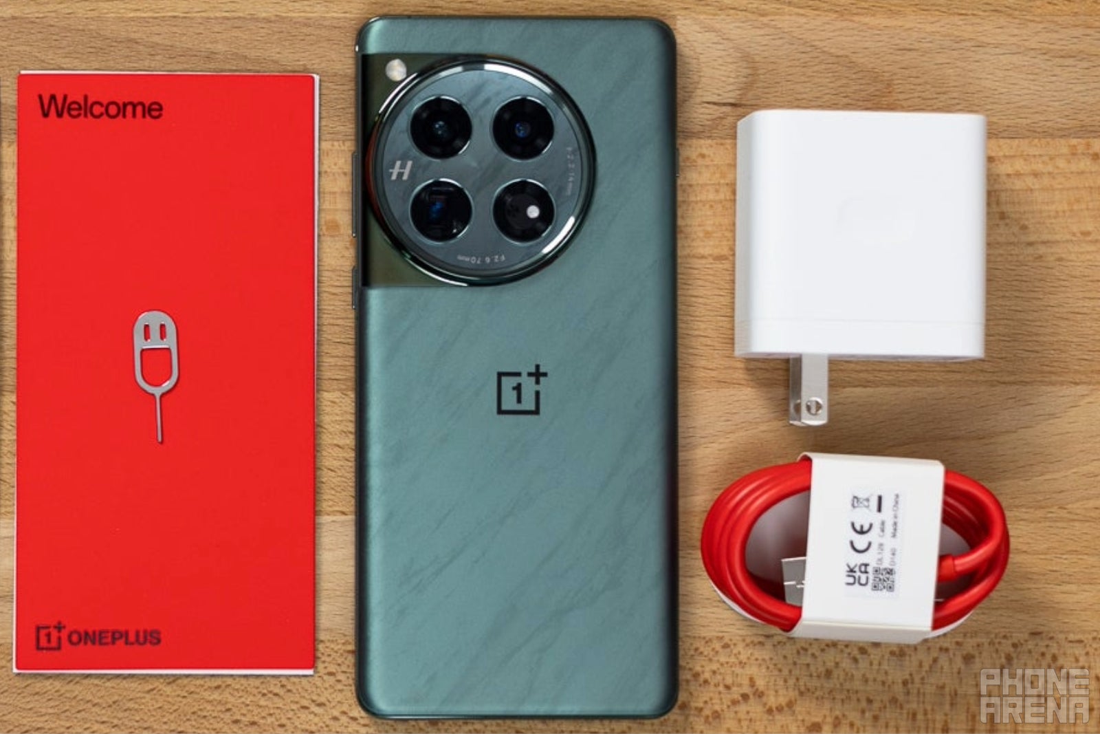 The latest OnePlus 12 has a charger in the box (Image Credit–PhoneArena) - Hold up, is Ikea undercutting Apple and Samsung&#039;s pricey power adapters?