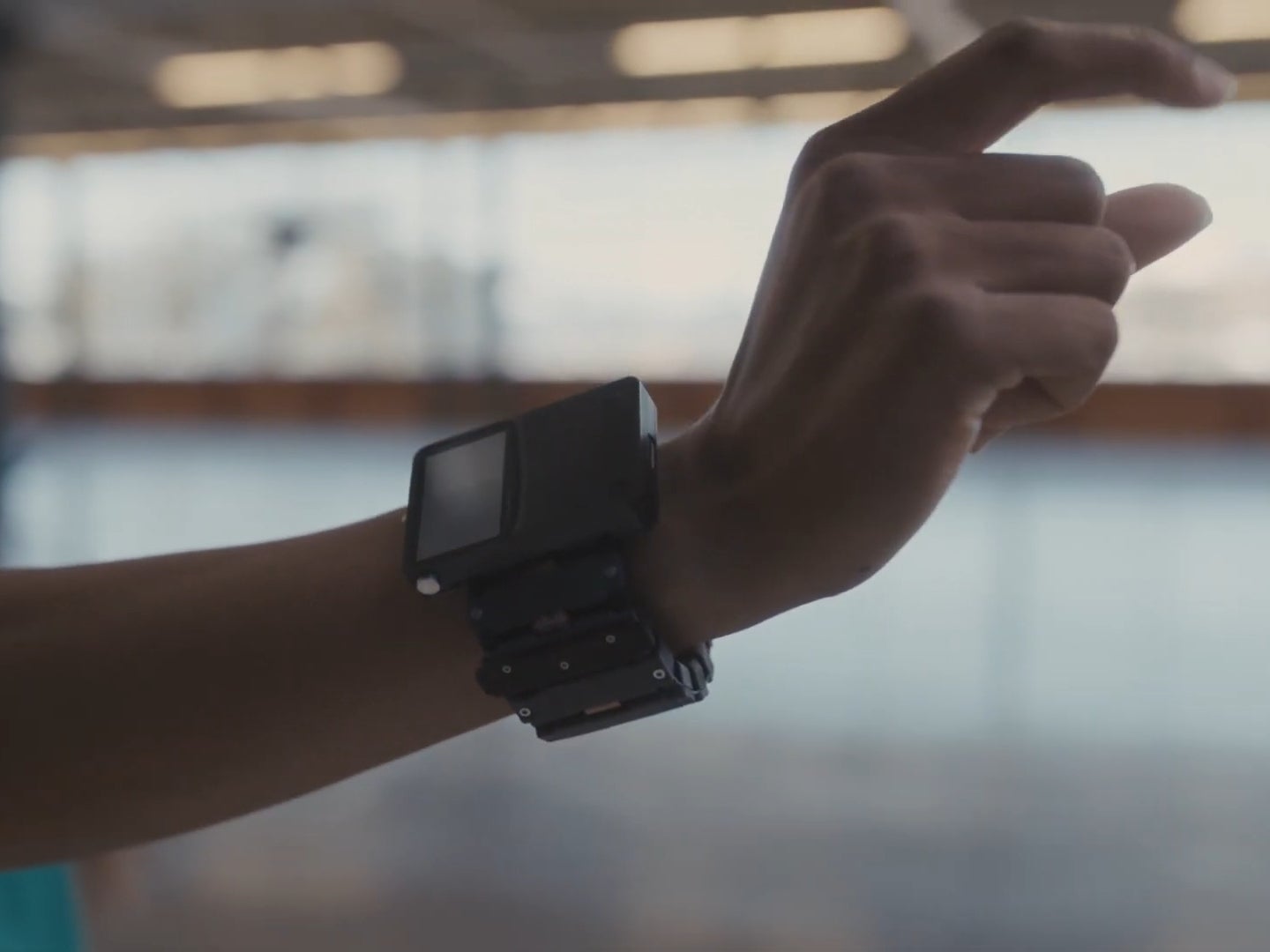 Meta’s neural interface wristband prototype. | Image credit — PhoneArena - One of Meta’s most vital AR researchers is stepping down