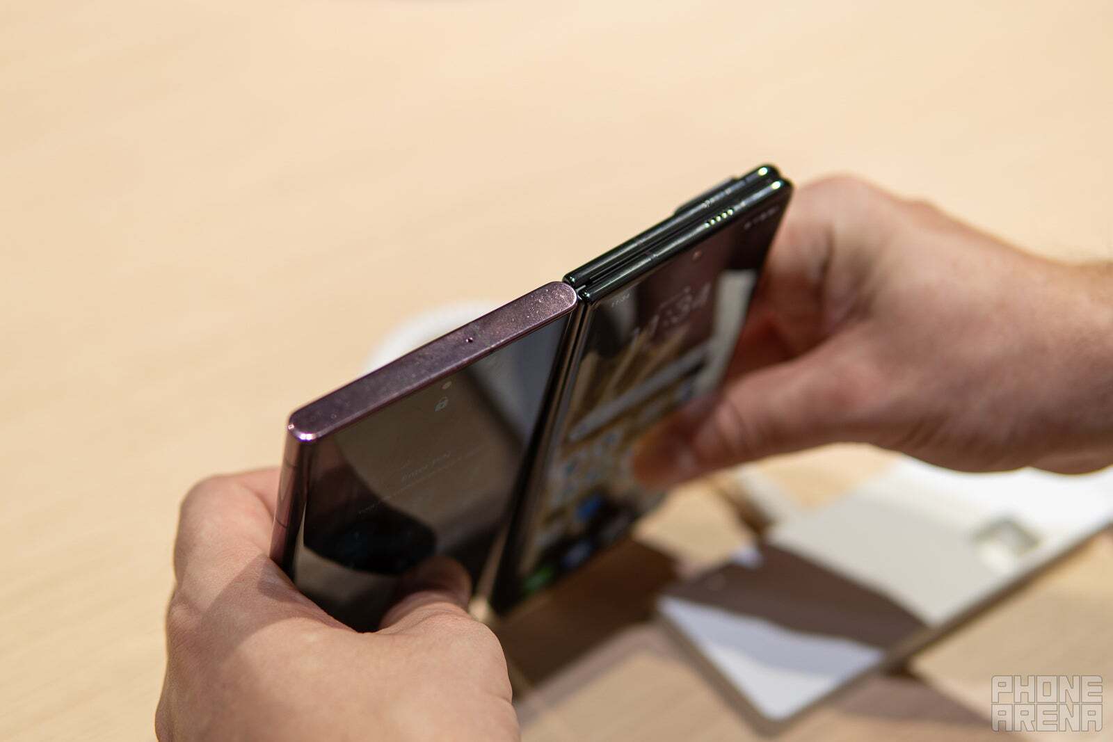 Honor Magic V2 thickness, next to Galaxy S22 Ultra. | Image credit - PhoneArena - Apple should copy Samsung for the foldable iPhone, not Huawei