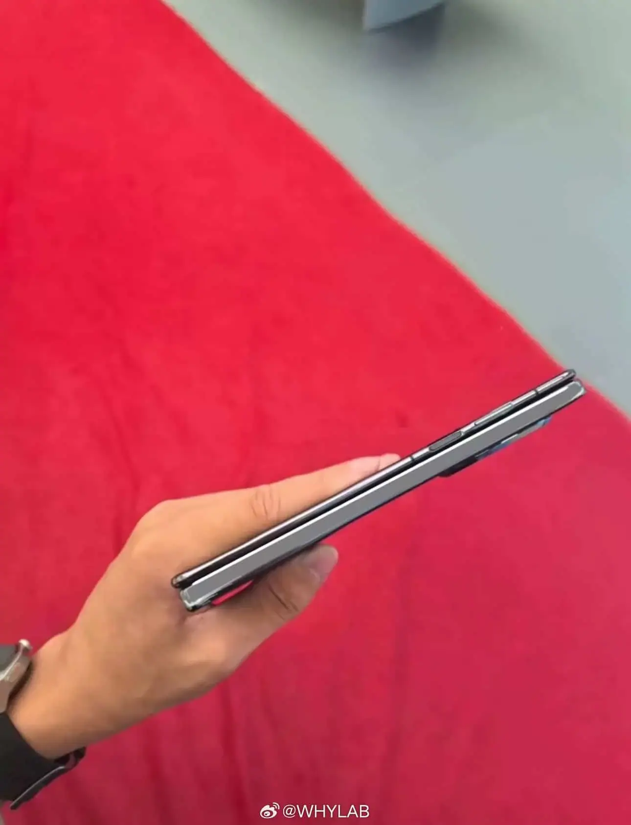 A foldable phone seen from the side, rumored to be the tri-fold Huawei foldable.