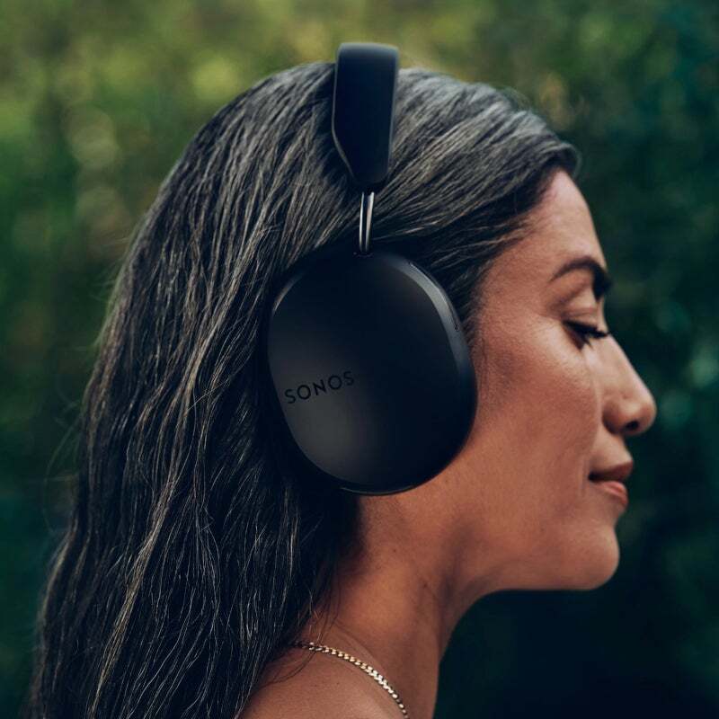 Image of a woman wearing a pair of Sonos Ace headphones