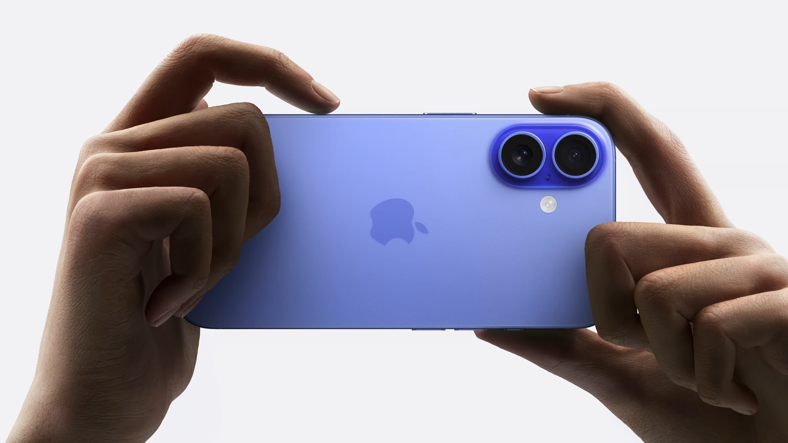 The iPhone 16 in Ultramarine. | Image Credit - Apple - iPhone 16 colors: all the official shades