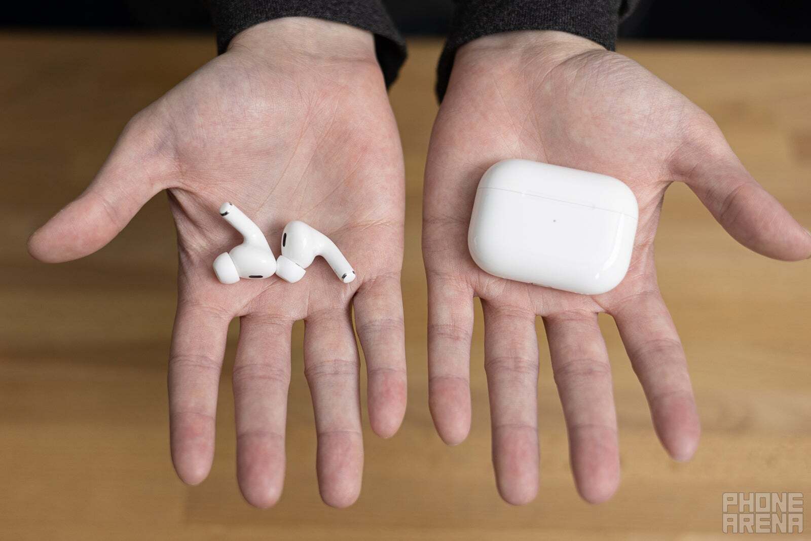 AirPods Pro 2 in a person hands. 