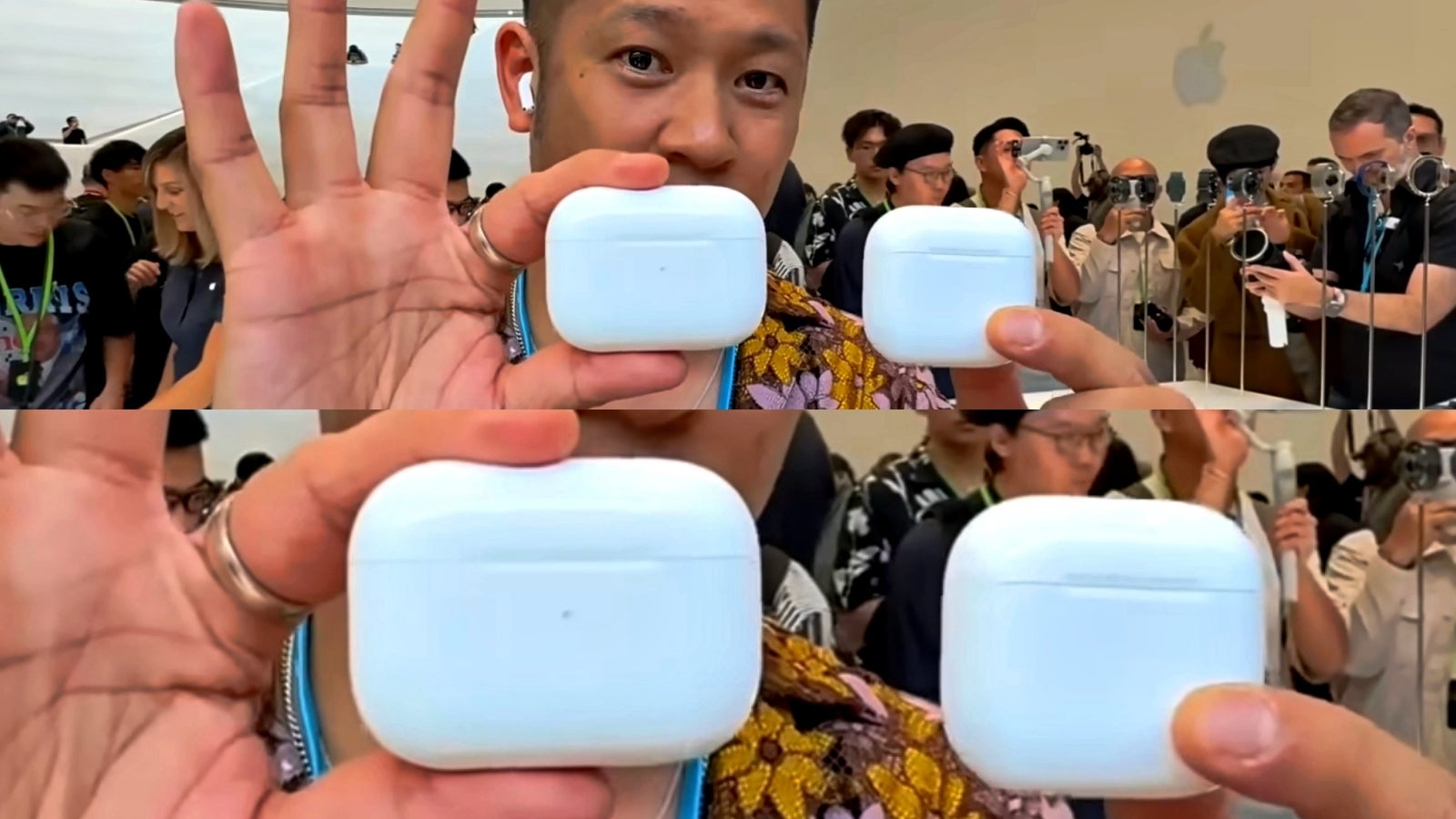 Tech reviewer holding up AirPods Pro 2 and AirPods 4 cases.