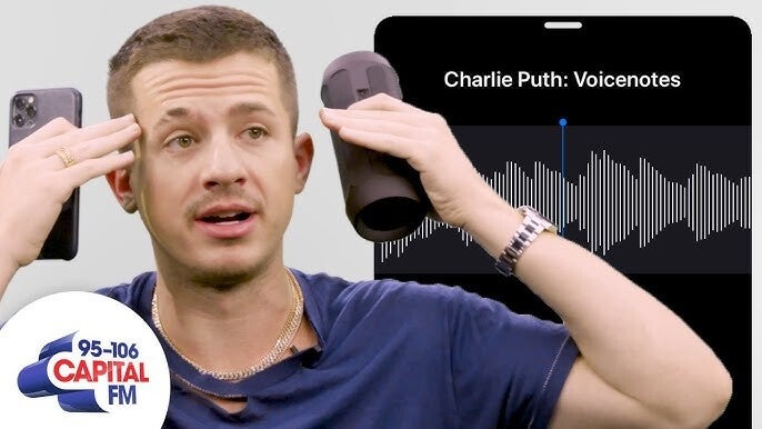 Singer Charlie Puth holding up an iPhone and a microphone.