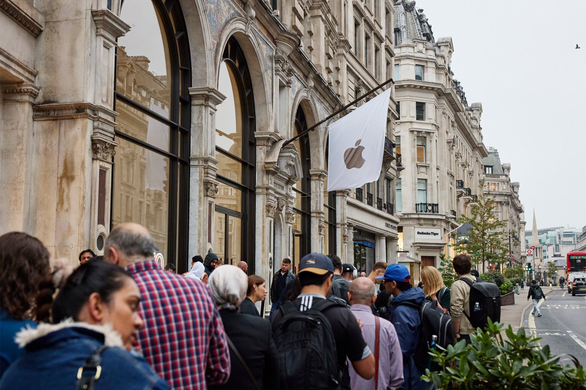 A long line queues up to enter the Apple Store on Regent Street in London. | Image credit-Apple - Apple Stores arund the globe were crowded last Friday as the iPhone 16 line was released