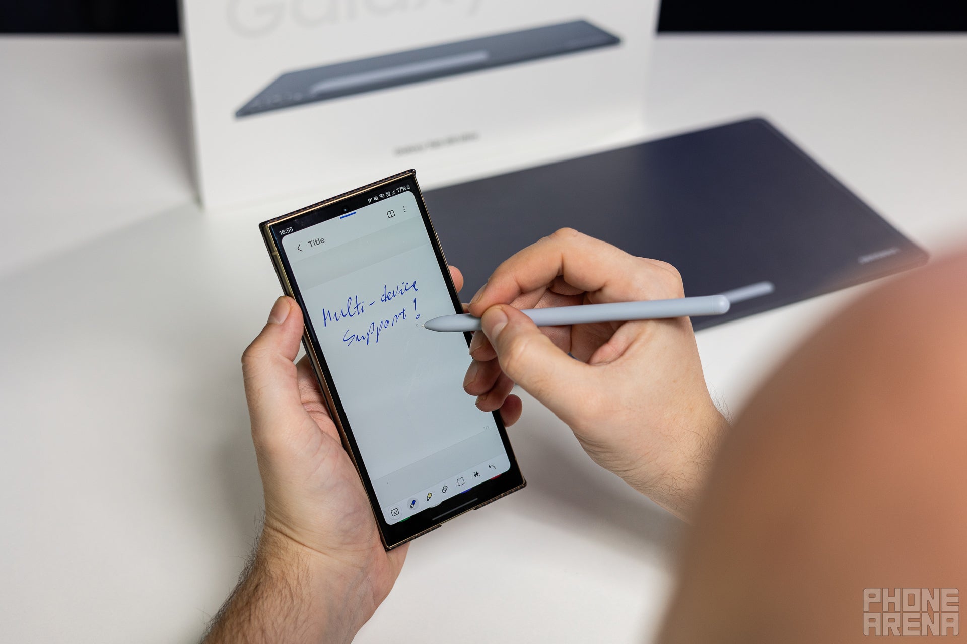 Writing on a Galaxy S24 Ultra phone using the S Pen from a Galaxy Tab S10 Ultra