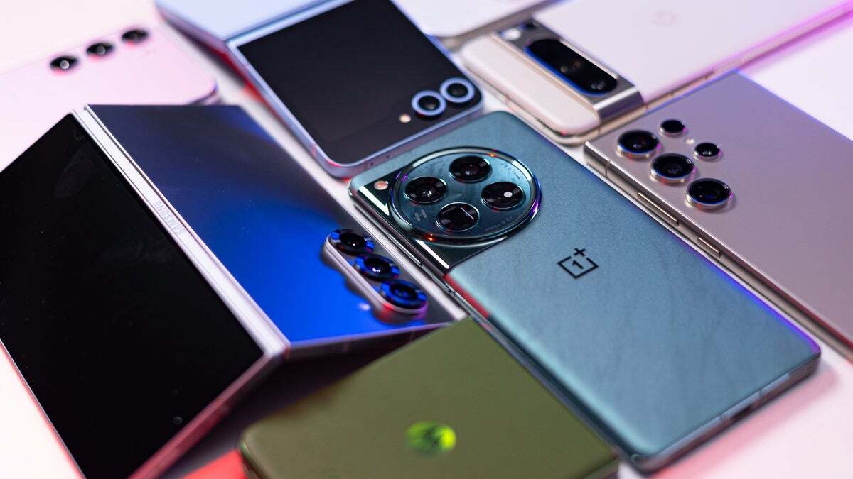 A collection of different smartphones, including flip phones and different camera configurations.