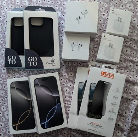 Picture shows devices and accessories received by a T-Mobile subscriber who did not order them.