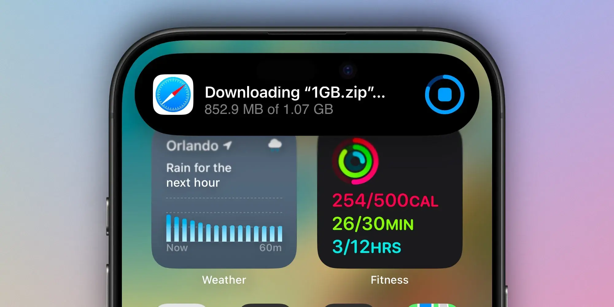 An iPhone showing Live Activity on the Dynamic Island which shows the progress of an ongoing download.